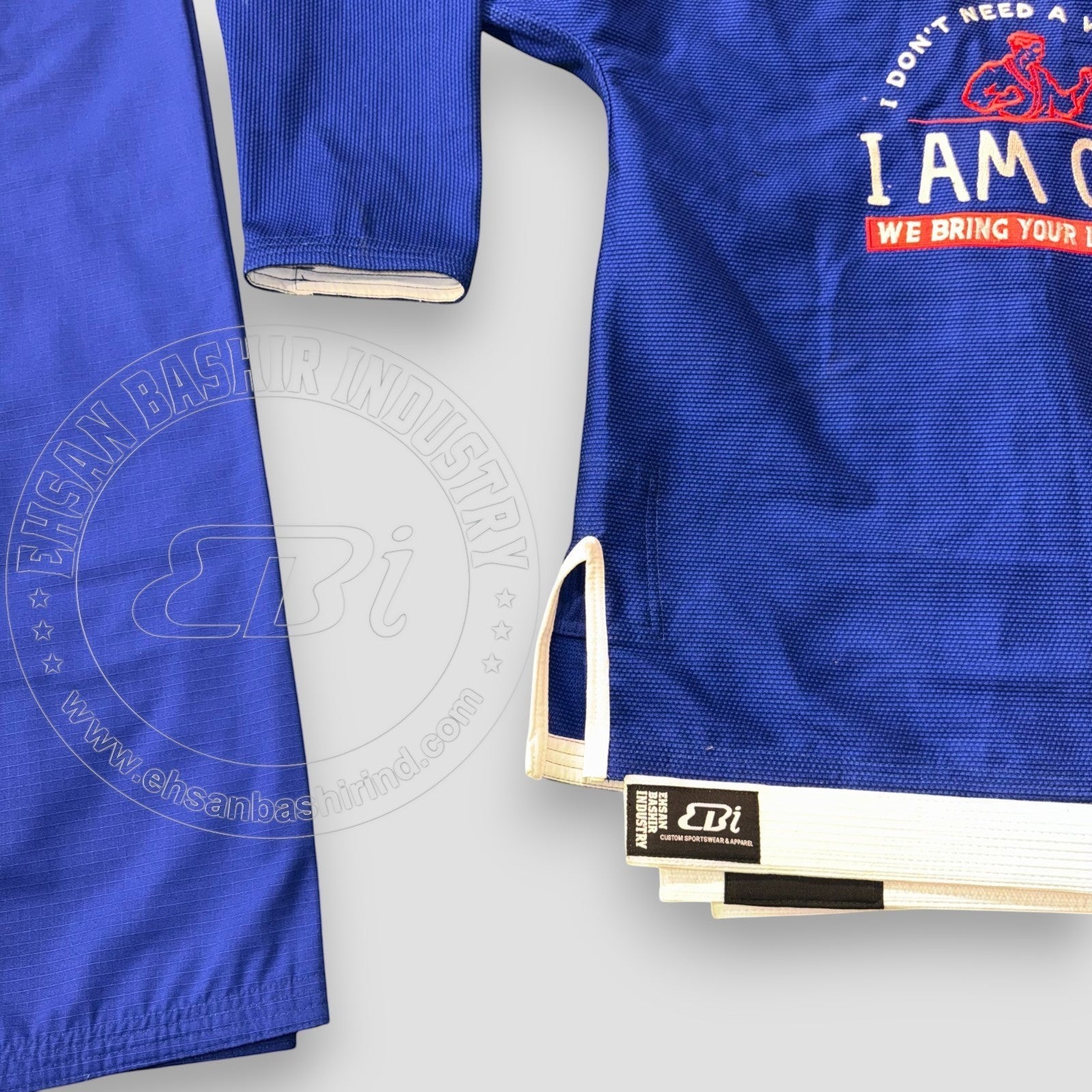Ehsan Bashir Industry blue cotton Jiu Jitsu uniform with "I AM ONE" graphic on back. Includes white belt.